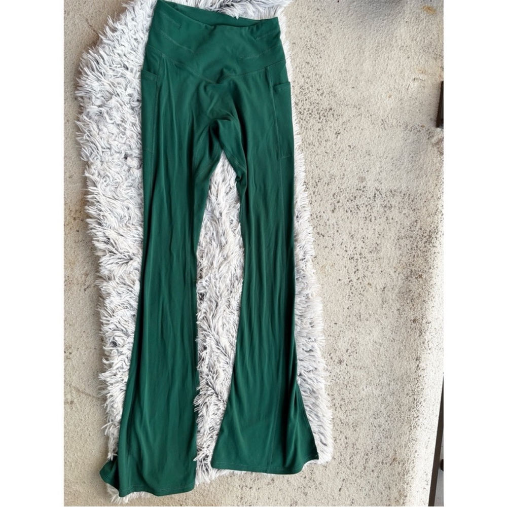 NWOT Free people movement Deep Green Activewear Pants flare leg with slit size L